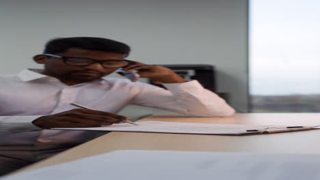 Indian-man-talking-on-the-phone