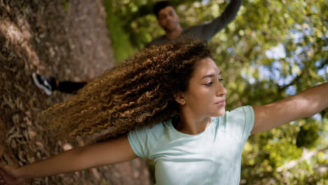 Couple-stretching-outdoors