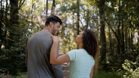 Two-friends-walking-on-the-woods