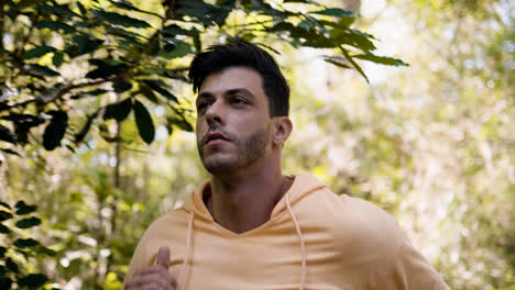 Young-man-running-in-the-forest