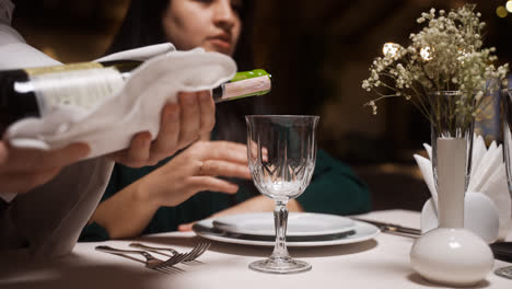 A-waiter-pouring-wine