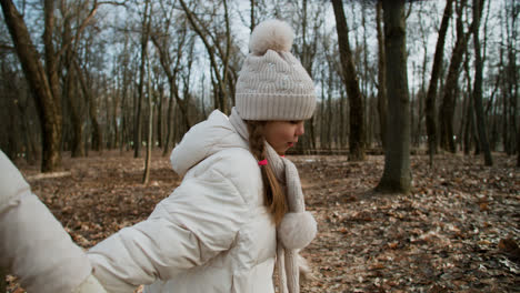 Little-girl-walking-with-her-mom