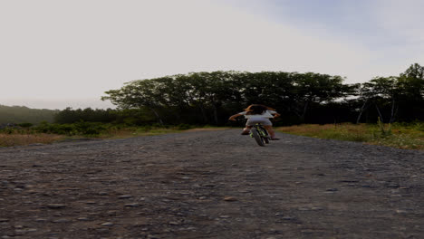 Dad-and-daughter-riding-bike