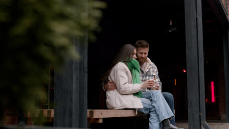 Couple-drinking-outside