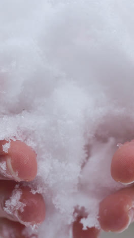 Hands-with-snow