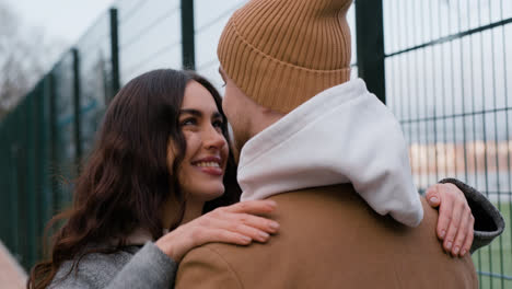 Couple-hugging-outside