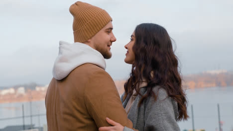 Couple-hugging-outside