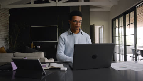 African-american-person-working-at-home