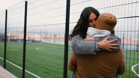 Couple-hugging-outside