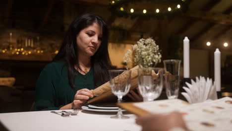 Woman-reading-a-menu