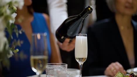 Waiter-serving-champagne