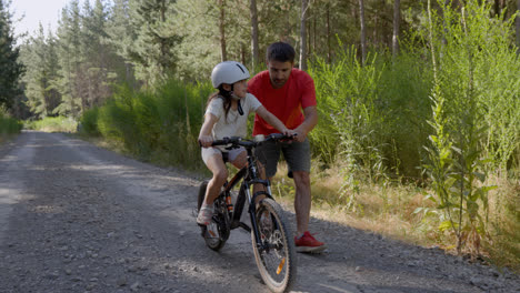 Child-learning-to-ride-a-bike