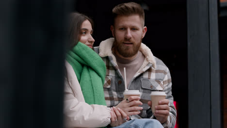 Couple-drinking-outside