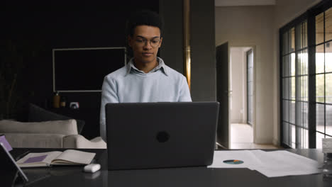 African-american-person-working-at-home