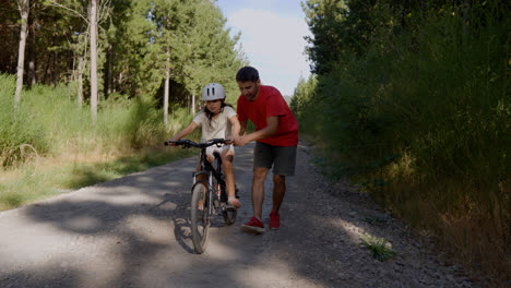 Child-learning-to-ride-a-bike