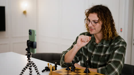 Young-man-recording-a-chess-tutorial