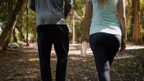 Two-friends-walking-on-the-woods