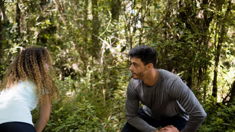 Couple-stretching-outdoors