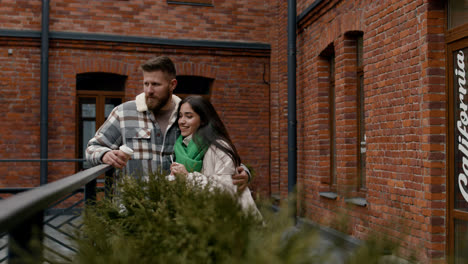 Couple-hugging-outside