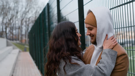 Couple-hugging-outside