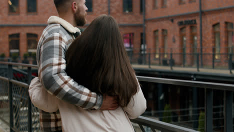 Couple-hugging-outside