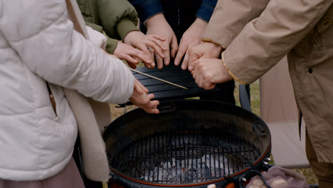 People-warming-hands