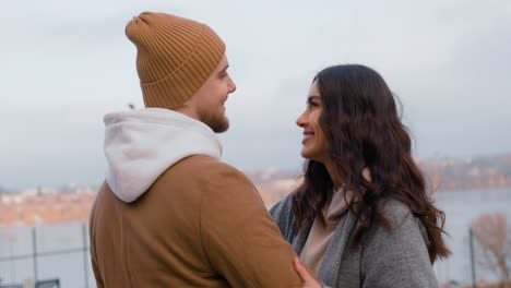 Couple-hugging-outside