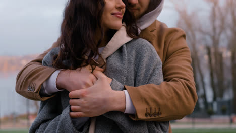 Couple-hugging-outside