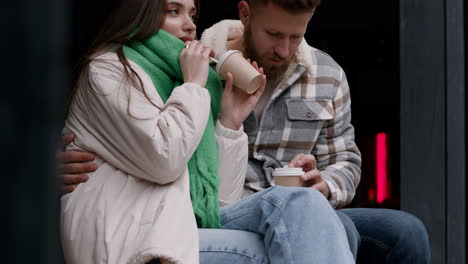 Couple-drinking-outside