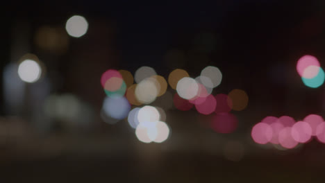 Luces-Bokeh-De-La-Ciudad-De-Noche