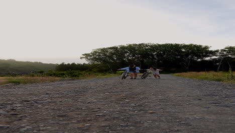 Mom-and-daughter-walking-with-bike