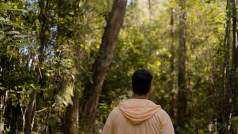 Young-man-running-in-the-forest