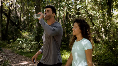 Couple-walking-through-the-forest