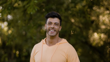 Smiling-man-posing-outdoors