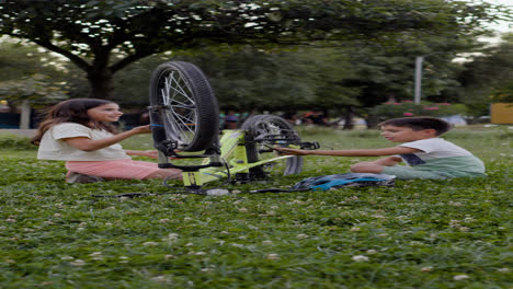 Kids-repairing-a-bike