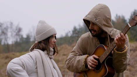 Man-playing-guitar