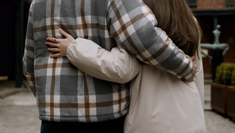 Couple-hugging-outside