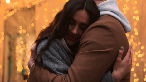 Couple-hugging-outside