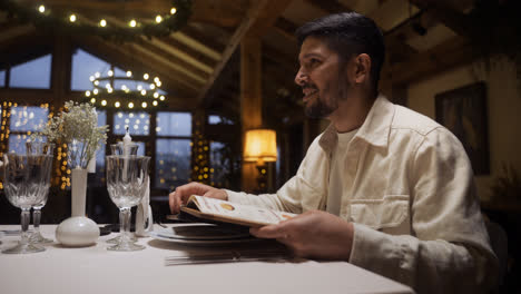 Man-reading-a-menu