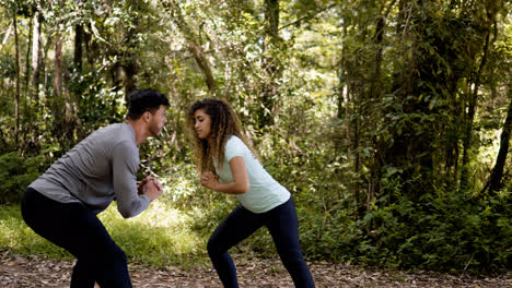 Couple-stretching-outdoors