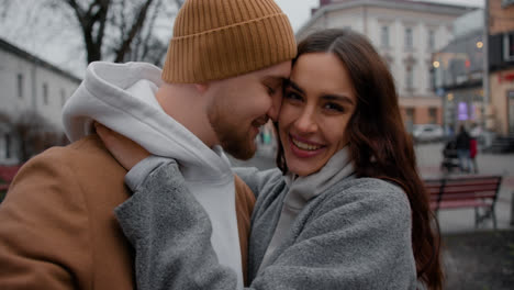 Couple-hugging-outside