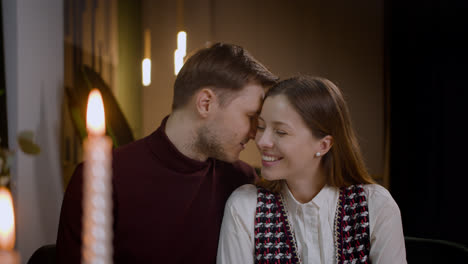 A-couple-cuddling-at-home