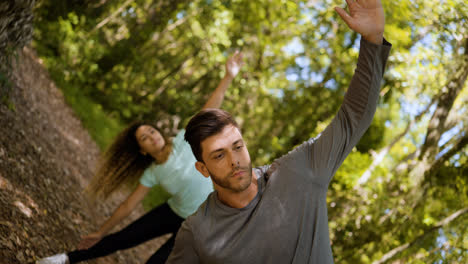 Couple-stretching-outdoors