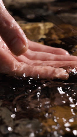 Hand-trying-to-take-water