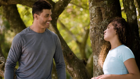 Smiling-friends-talking-outdoors