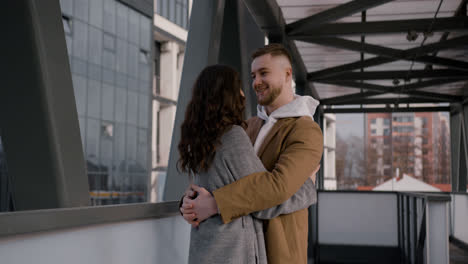 Couple-hugging-outside