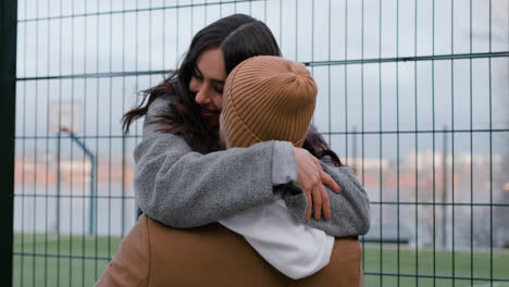 Couple-hugging-outside