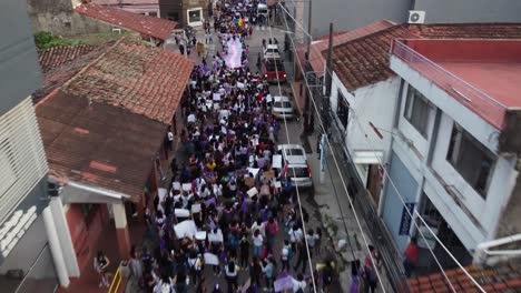 Activists-line-up-on-street-to-march,-Women's-Day,-Santa-Cruz-Bolivia