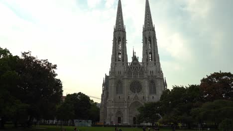 Austrians-Eating-on-the-Grass-near-Votivkirche-in-Vienna-during-Late-Summer-Evening