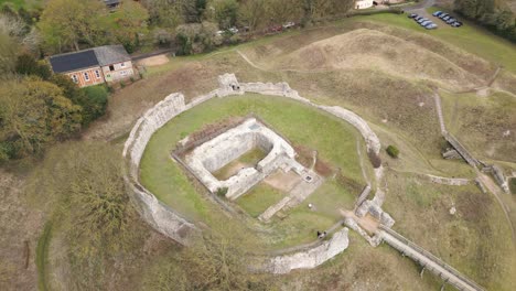 Rotating-Drone-View-of-Bailey-Gate-at-Castle-Acre-Priory-Ruins